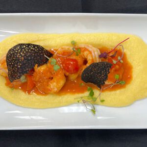 Shrimp na Buzaru on polenta